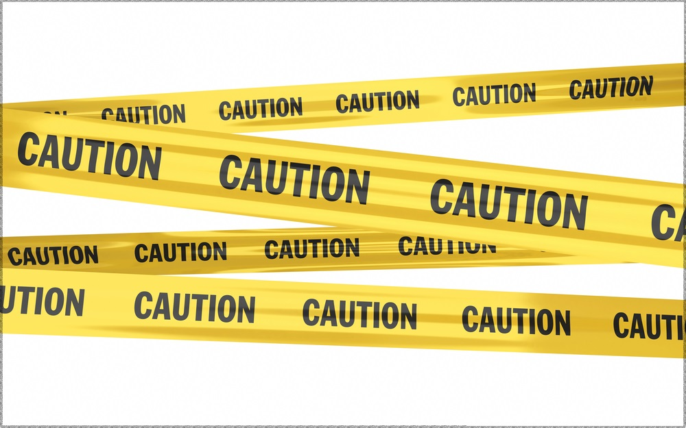 Zigzags of yellow Caution tape (credit: heromen30 / Shutterstock.com)