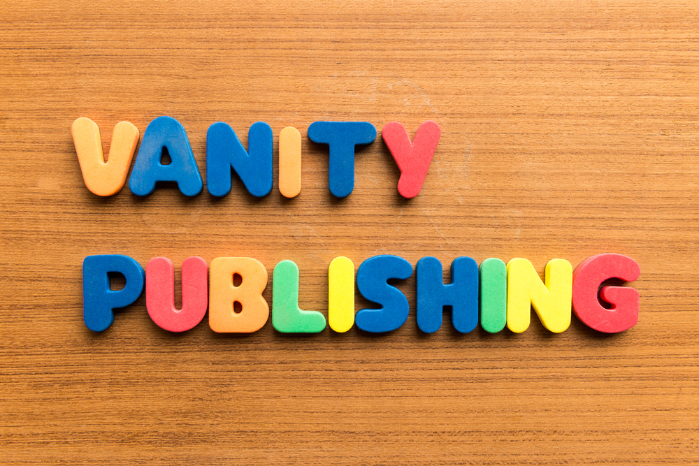 Header image: Vanity Publishing in fat, multicolored letters on a brown woodgrain background