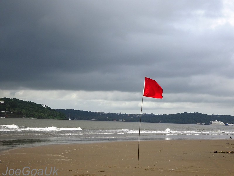 Header image: red flag flying on a beach (credit: Joegoauk Goa / Flickr.com)